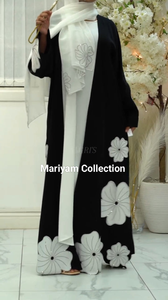 modern black and white abaya with white flower embroidery