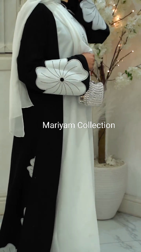 modern black and white abaya with white flower embroidery